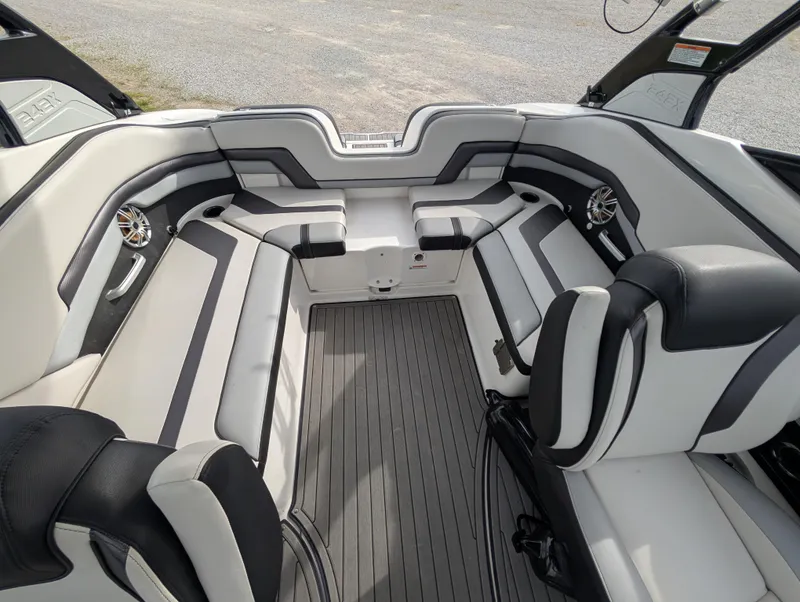 Slide: The Image of 2017 Yamaha Boats 242X E-Series interior with sleek seating and modern design. - 30