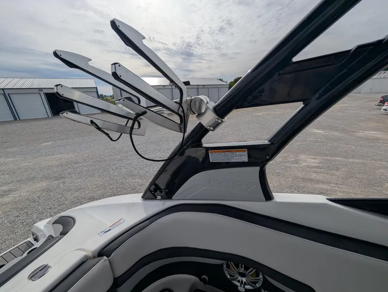 Slide: The Image of 2017 Yamaha Boats 242X E-Series wakeboard tower in storage area. - 31