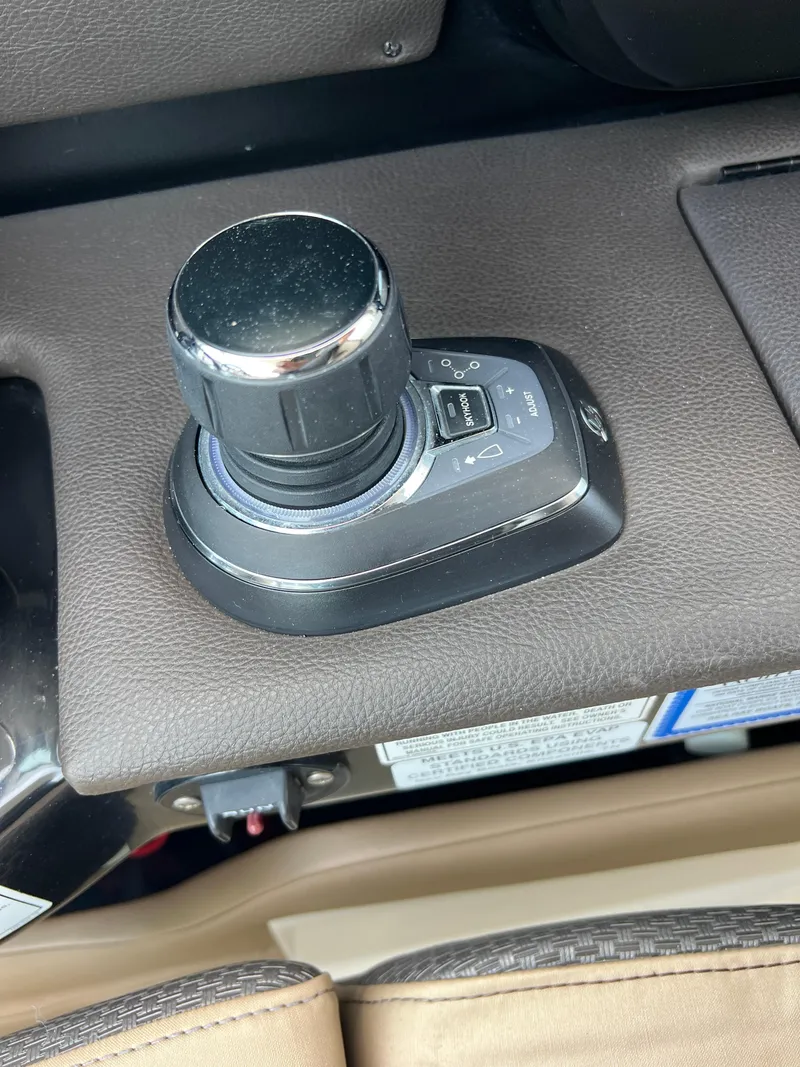 Slide: The Image of Joystick control on 2017 Sea Ray SLX 350 OB boat dashboard. - 42