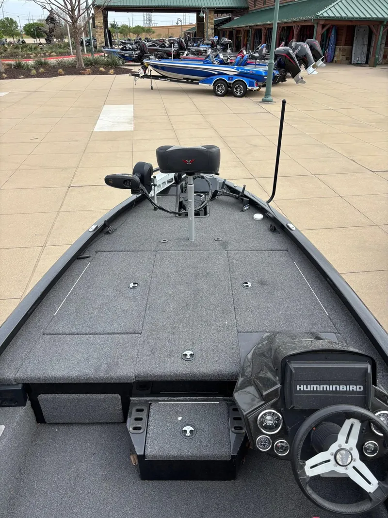 Slide: The Image of 2020 Vexus AVX1880 boat with Humminbird electronics, displayed outdoors. - 5