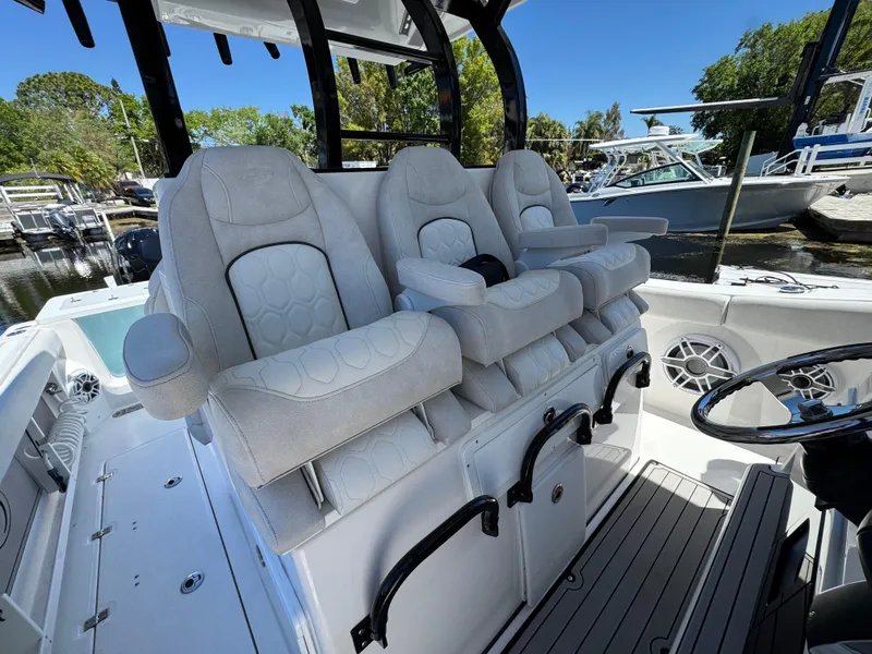Slide: The Image of 2022 Sea Fox 368 Commander boat with luxurious seating and modern helm design. - 19