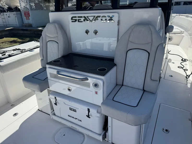 Slide: The Image of 2022 Sea Fox 368 Commander boat interior with seating and storage. - 24