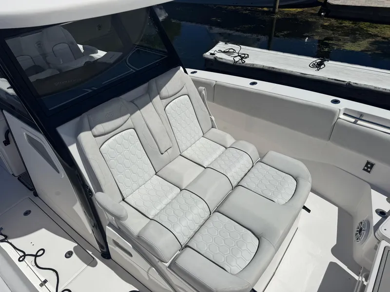 Slide: The Image of 2022 Sea Fox 368 Commander boat with luxurious white seating and sleek design. - 31