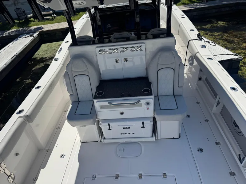 Slide: The Image of 2022 Sea Fox 368 Commander boat interior with seating and storage compartments. - 39
