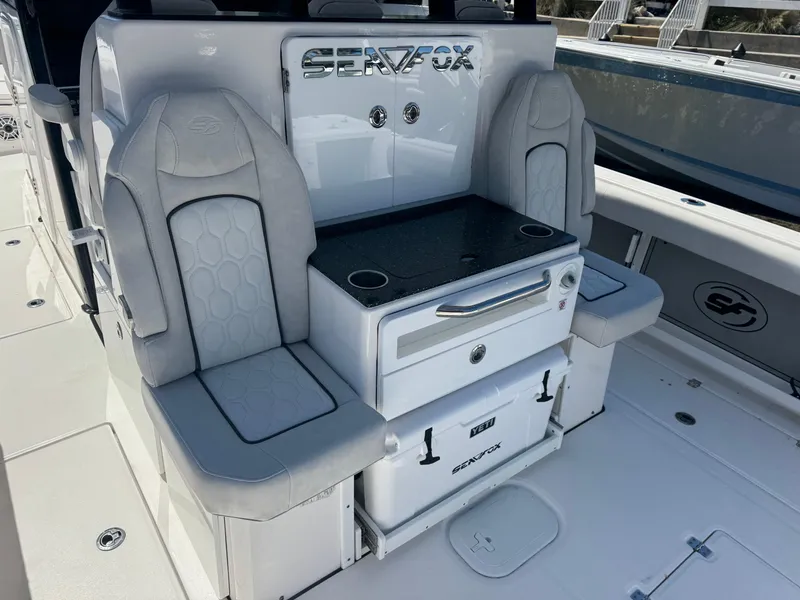 Slide: The Image of 2022 Sea Fox 368 Commander boat interior with seating and storage features. - 41
