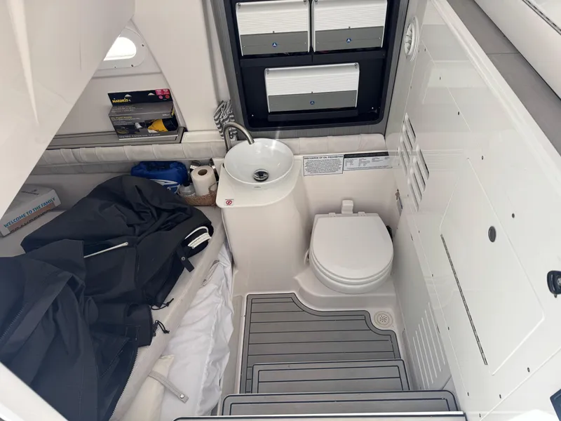 Slide: The Image of Interior of 2022 Sea Fox 368 Commander boat with sink, toilet, and storage. - 48