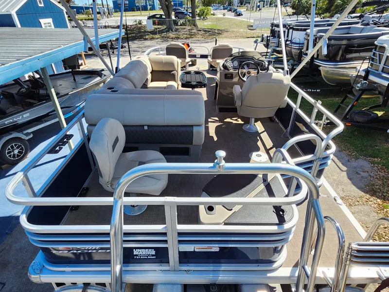 Slide: The Image of 2023 Sun Tracker Fishin' Barge 20 DLX pontoon boat with spacious seating and modern design. - 8