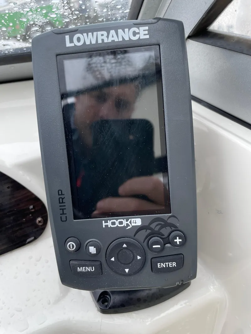 Slide: The Image of Lowrance Hook fish finder on 2017 Stingray 191 DC boat dashboard. - 16