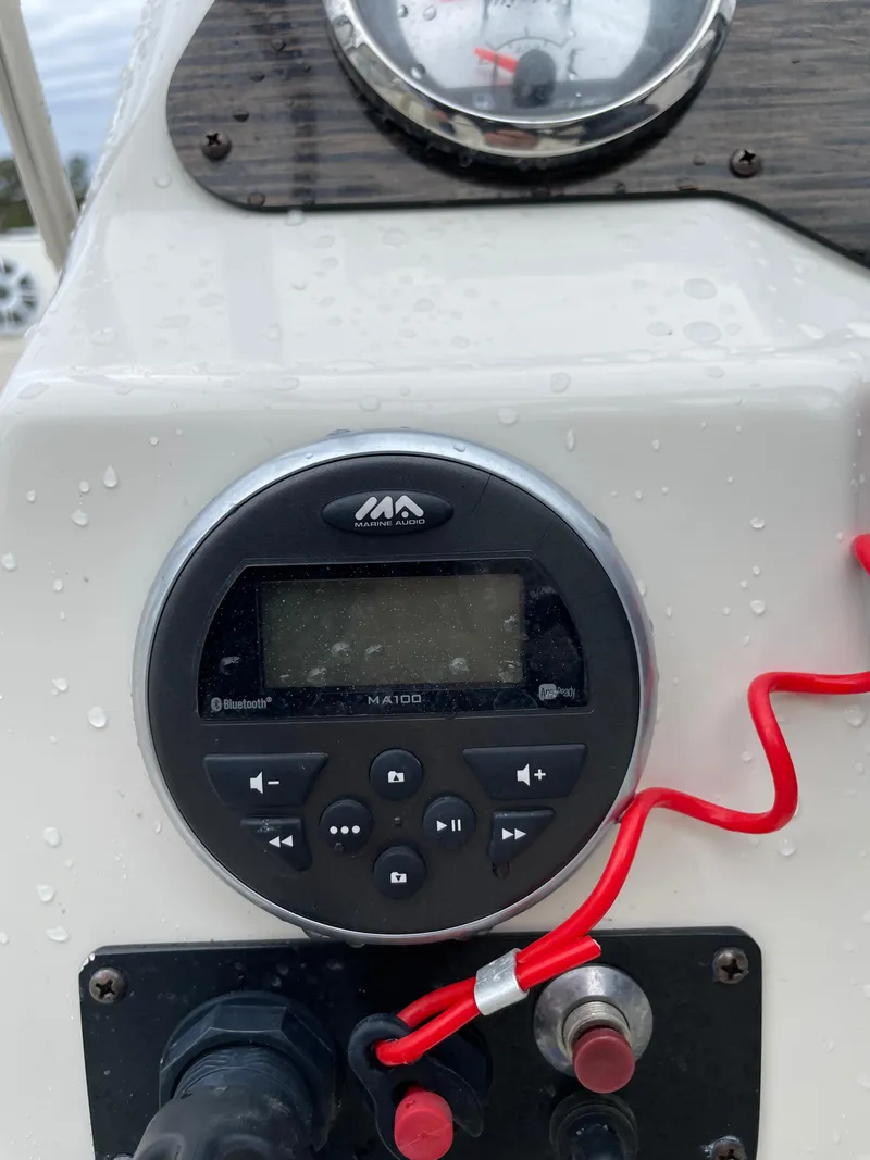 Slide: The Image of Control panel of a 2017 Stingray 191 DC boat with marine audio system. - 18