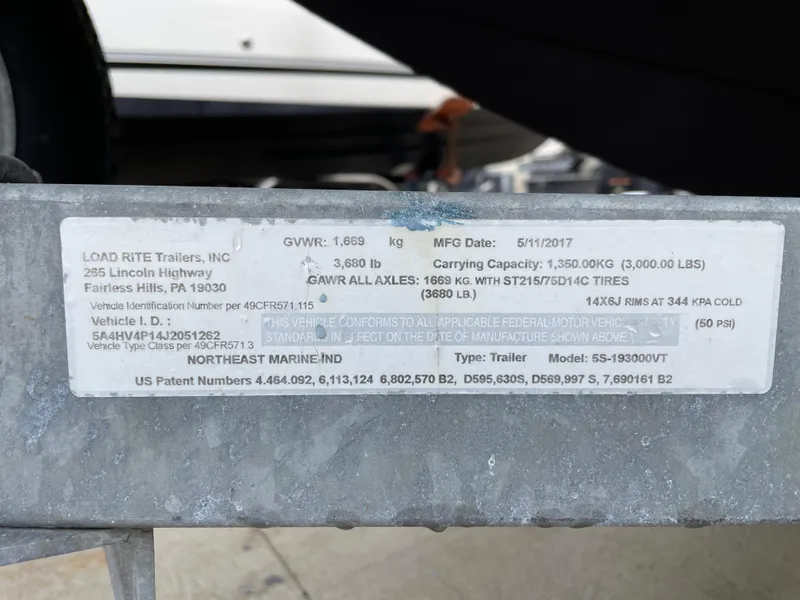 Slide: The Image of Label on Load Rite trailer detailing specifications and manufacturing information. - 21