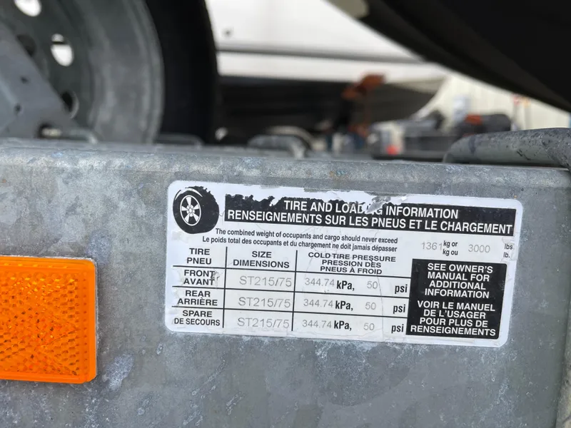 Slide: The Image of Tire and loading information label on a 2017 Stingray 191 DC trailer. - 22