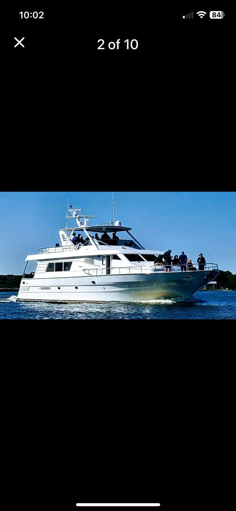 Slide: The Image of Tarrab 1997 motor yacht cruising on calm waters under clear blue sky. - 1