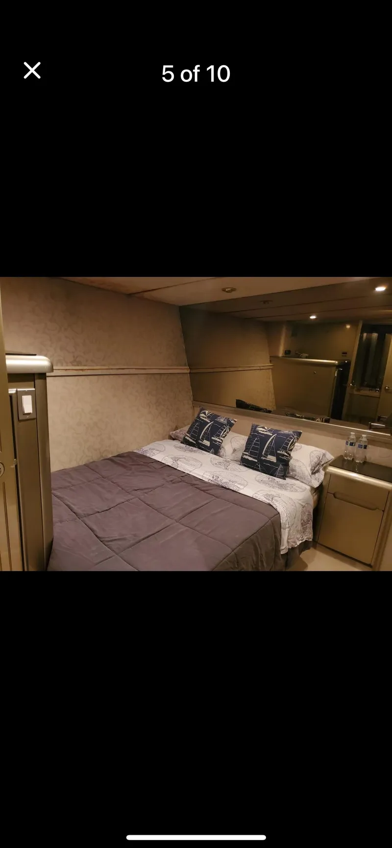 Slide: The Image of Luxurious bedroom interior of 1997 Tarrab Motor Yacht with cozy bedding and elegant decor. - 5