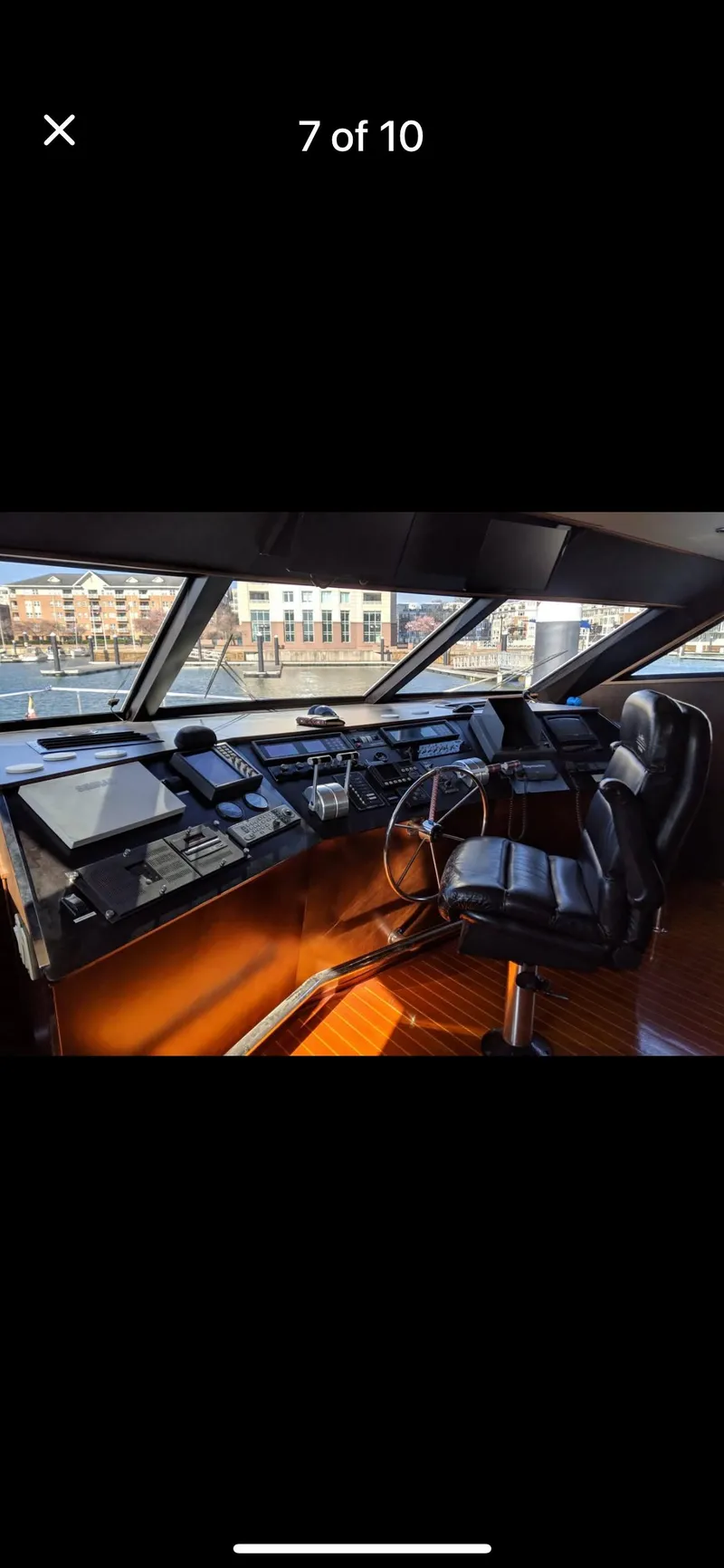 Slide: The Image of Cockpit of 1997 Tarrab Motor Yacht with navigation controls and leather seating. - 6