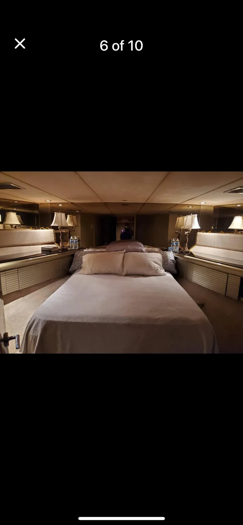 Slide: The Image of Luxurious bedroom interior of 1997 Tarrab Motor Yacht with elegant lighting and cozy bedding. - 7