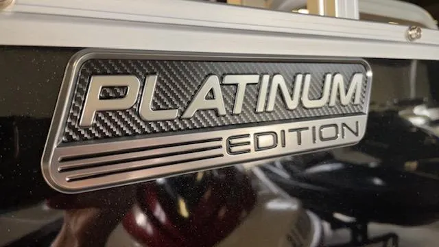 Slide: The Image of 2025 Tahoe LTZ 2385 VRL Platinum Edition badge with carbon fiber texture. - 4