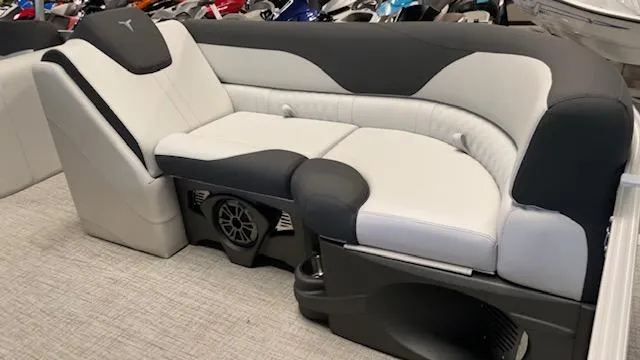 Slide: The Image of Luxurious seating in 2025 Tahoe LTZ 2385 VRL boat, featuring sleek black and white upholstery. - 8