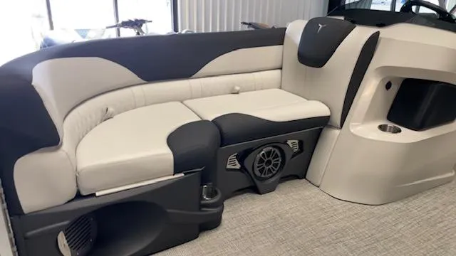Slide: The Image of Luxurious seating in 2025 Tahoe LTZ 2385 VRL boat, featuring modern design and built-in speakers. - 9
