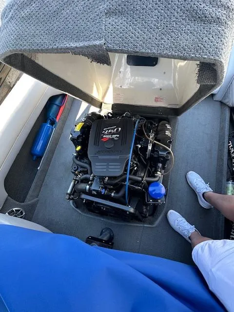 Slide: The Image of 2007 Ski Centurion T-5 Competition boat engine compartment with open cover. - 9