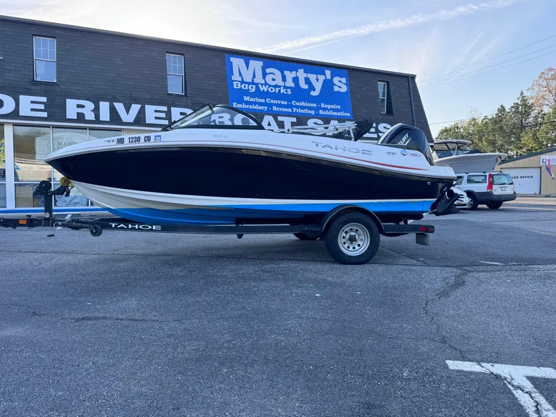 Slide: The Image of 2022 Tahoe 185 S boat on trailer outside Marty's Bag Works. - 3