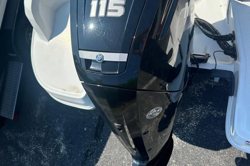 Slide: The Image of Outboard motor on a 2022 Tahoe 185 S boat, featuring a 115 horsepower engine. - 9