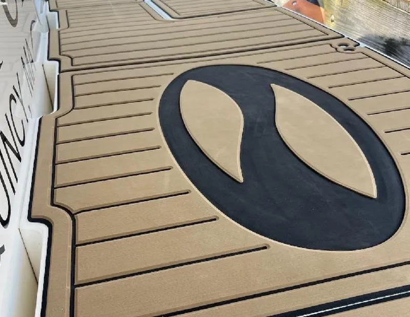 Slide: The Image of 2005 Silverton 34 Convertible boat deck with custom non-slip mat design. - 5