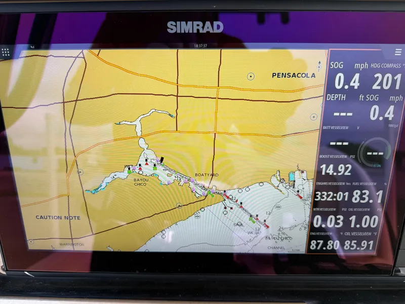 Slide: The Image of Simrad marine GPS display showing navigation map near Pensacola on a ShearWater 25LTZ, 2016 model. - 17