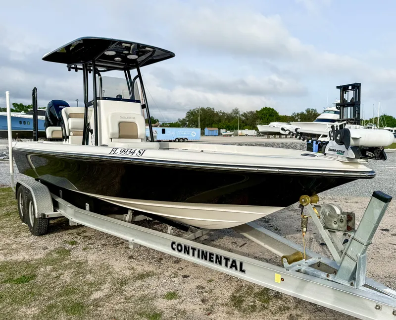 Slide: The Image of 2016 ShearWater 25LTZ boat on Continental trailer, parked outdoors. - 3