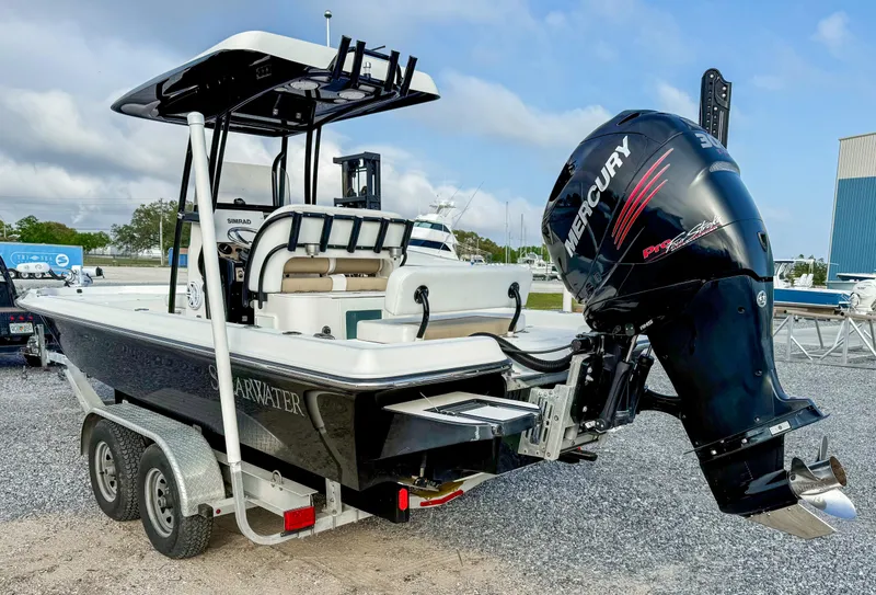 Slide: The Image of 2016 ShearWater 25LTZ boat with Mercury engine on a trailer. - 4