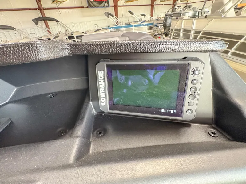 Slide: The Image of Lowrance Elite fish finder on 2025 Trifecta 23 UL SS Arch boat dashboard. - 16
