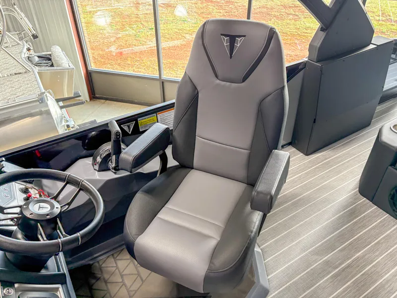 Slide: The Image of Captain's chair in 2025 Trifecta 23 UL SS Arch boat cockpit. - 17