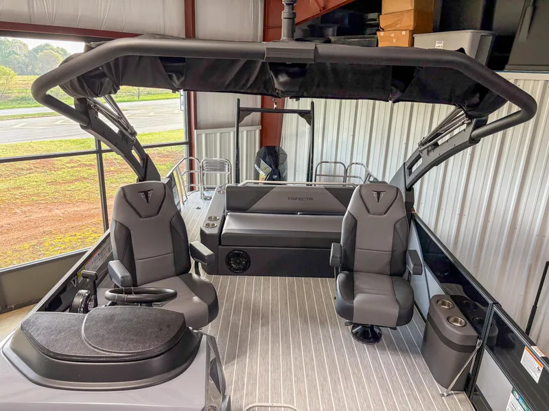 Slide: The Image of 2025 Trifecta 23 UL SS Arch boat interior with sleek seating and modern design. - 18