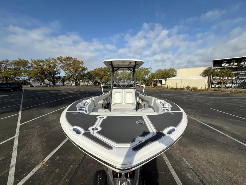 Slide: The Image of 2021 Sea Fox 248 Commander boat in a parking lot under a clear sky. - 10