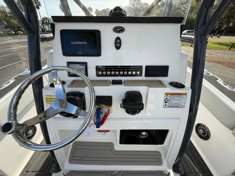 Slide: The Image of 2021 Sea Fox 248 Commander dashboard with Garmin display and steering wheel. - 15