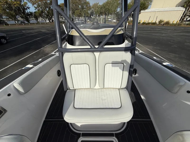 Slide: The Image of 2021 Sea Fox 248 Commander boat interior with white seating and sleek design. - 26