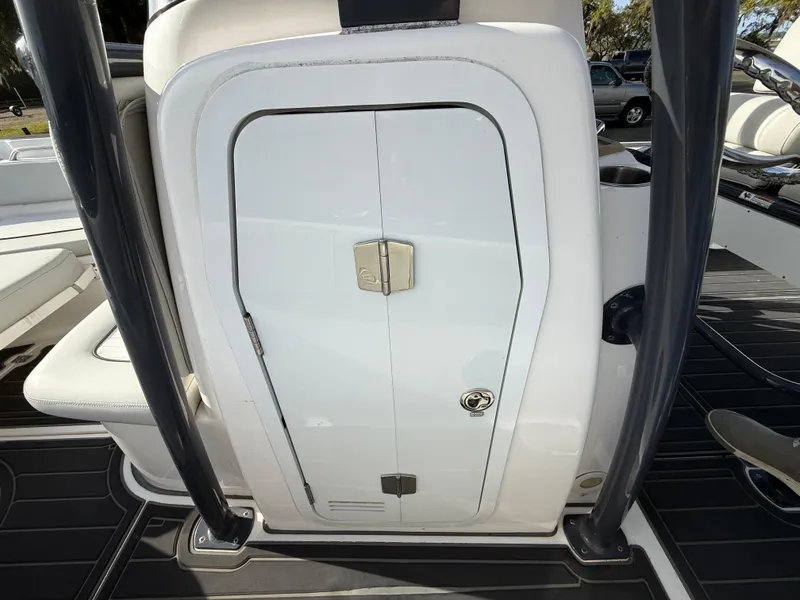 Slide: The Image of 2021 Sea Fox 248 Commander console storage door with sleek design and secure latch. - 28