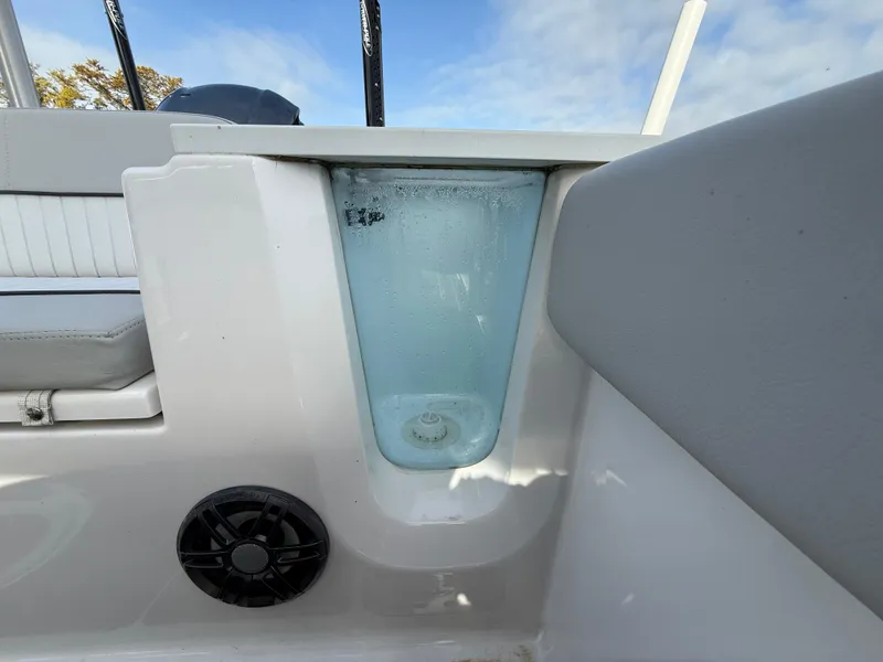 Slide: The Image of 2021 Sea Fox 248 Commander boat interior with speaker and storage compartment. - 29