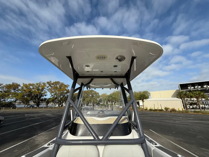 Slide: The Image of 2021 Sea Fox 248 Commander boat with T-top under a blue sky. - 31