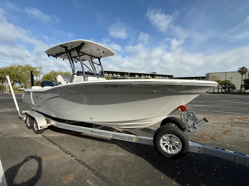 Slide: The Image of 2021 Sea Fox 248 Commander boat on trailer, parked outdoors under a clear sky. - 9