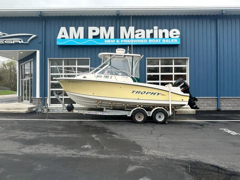 Slide: The Image of 2007 Trophy 2302 Walkaround boat on trailer at AM PM Marine dealership. - 0
