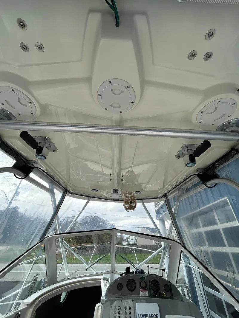 Slide: The Image of 2007 Trophy 2302 Walkaround boat interior with control panel and overhead view. - 5