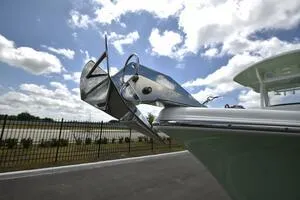 Slide: The Image of Close-up of a 2023 Sea Pro 239 Deep V CC engine component with serial number. - 14