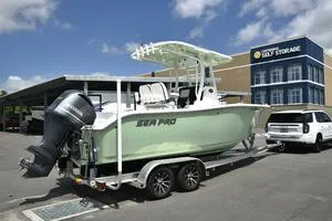 Slide: The Image of 2023 Sea Pro 239 Deep V CC boat interior with storage facility in background. - 22