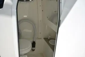 Slide: The Image of 2023 Sea Pro 239 Deep V CC boat with foldable seating and Yamaha engine. - 25