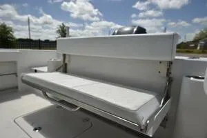 Slide: The Image of 2023 Sea Pro 239 Deep V CC fishing rod holders under a clear blue sky. - 30