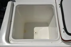 Slide: The Image of 2023 Sea Pro 239 Deep V CC boat interior with fishing rod storage. - 33