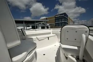 Slide: The Image of 2023 Sea Pro 239 Deep V CC boat interior with steering console and seating. - 35