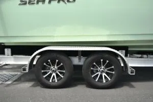 Slide: The Image of 2023 Sea Pro 239 Deep V CC boat with chrome logo, side view. - 44