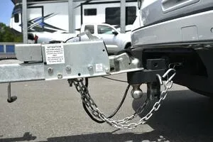 Slide: The Image of 2023 Sea Pro 239 Deep V CC boat on trailer under blue sky. - 46