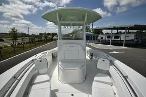 Slide: The Image of 2023 Sea Pro 239 Deep V CC boat on trailer under a cloudy sky. - 6